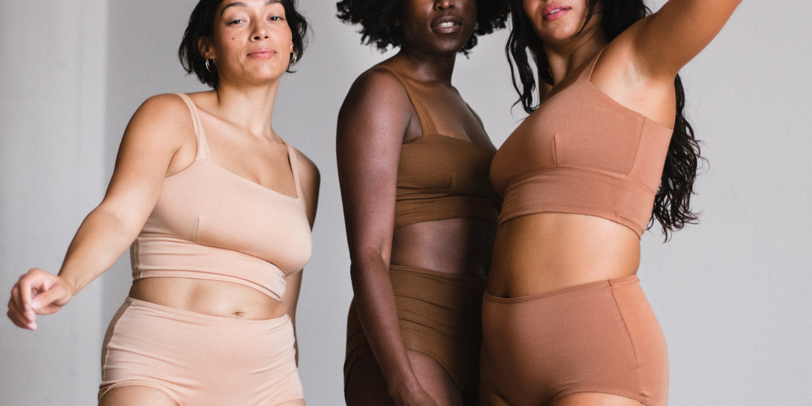 models wear organic cotton with hemp proclaim bras and briefs in lagoon green, lilac light purple and poppy bright red