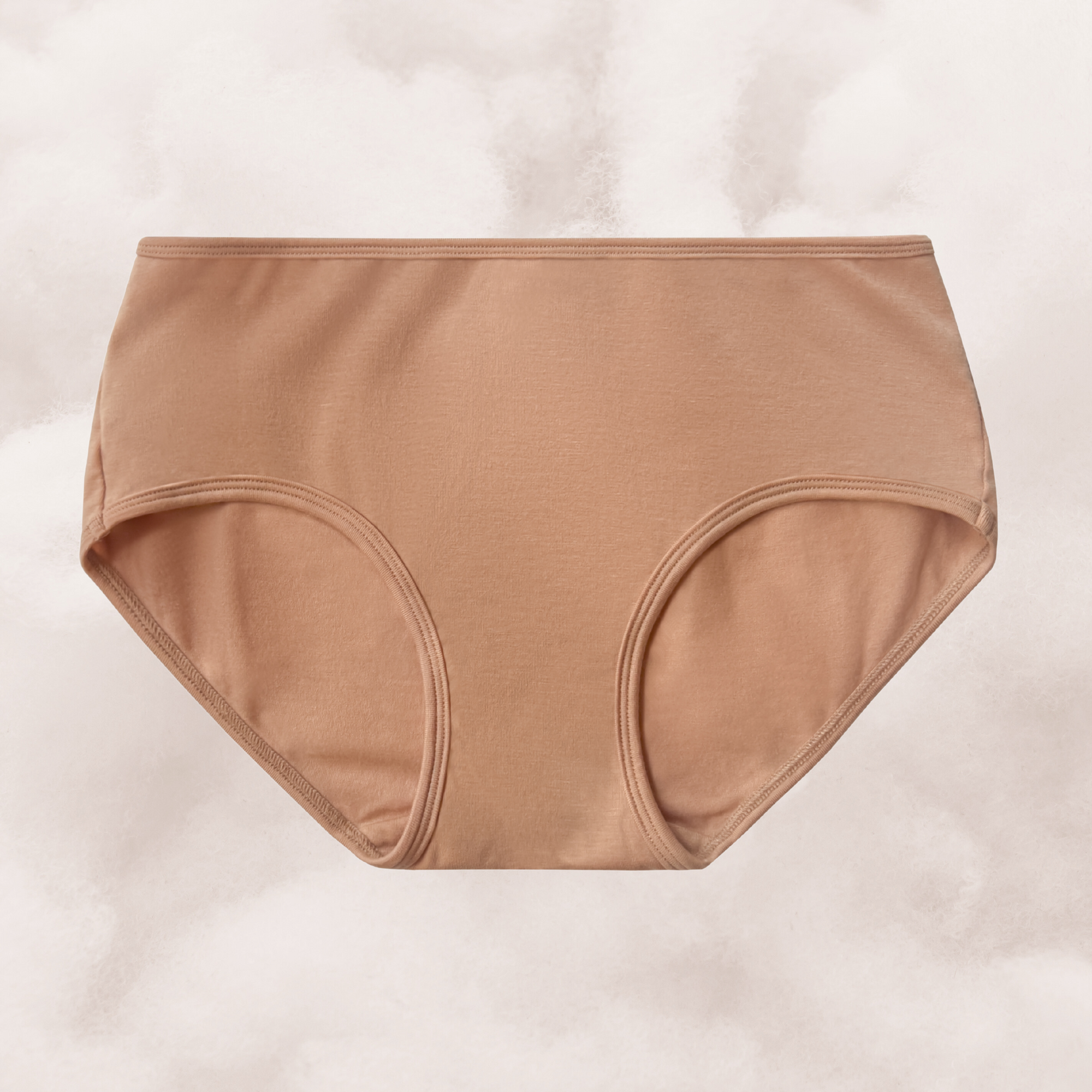 PROCLAIM organic cotton mid rise brief in maya nude a medium nude caramel tone