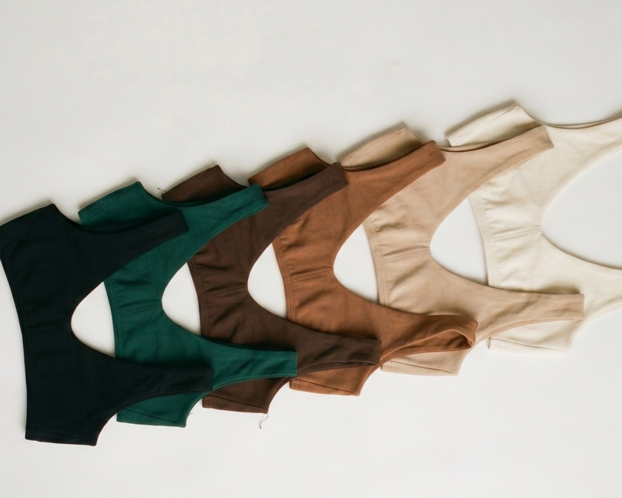 flat lay of all organic cotton everyday bralette bras made in la